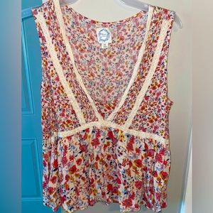Francesca’s low cut floral print tank top. Size Medium.
